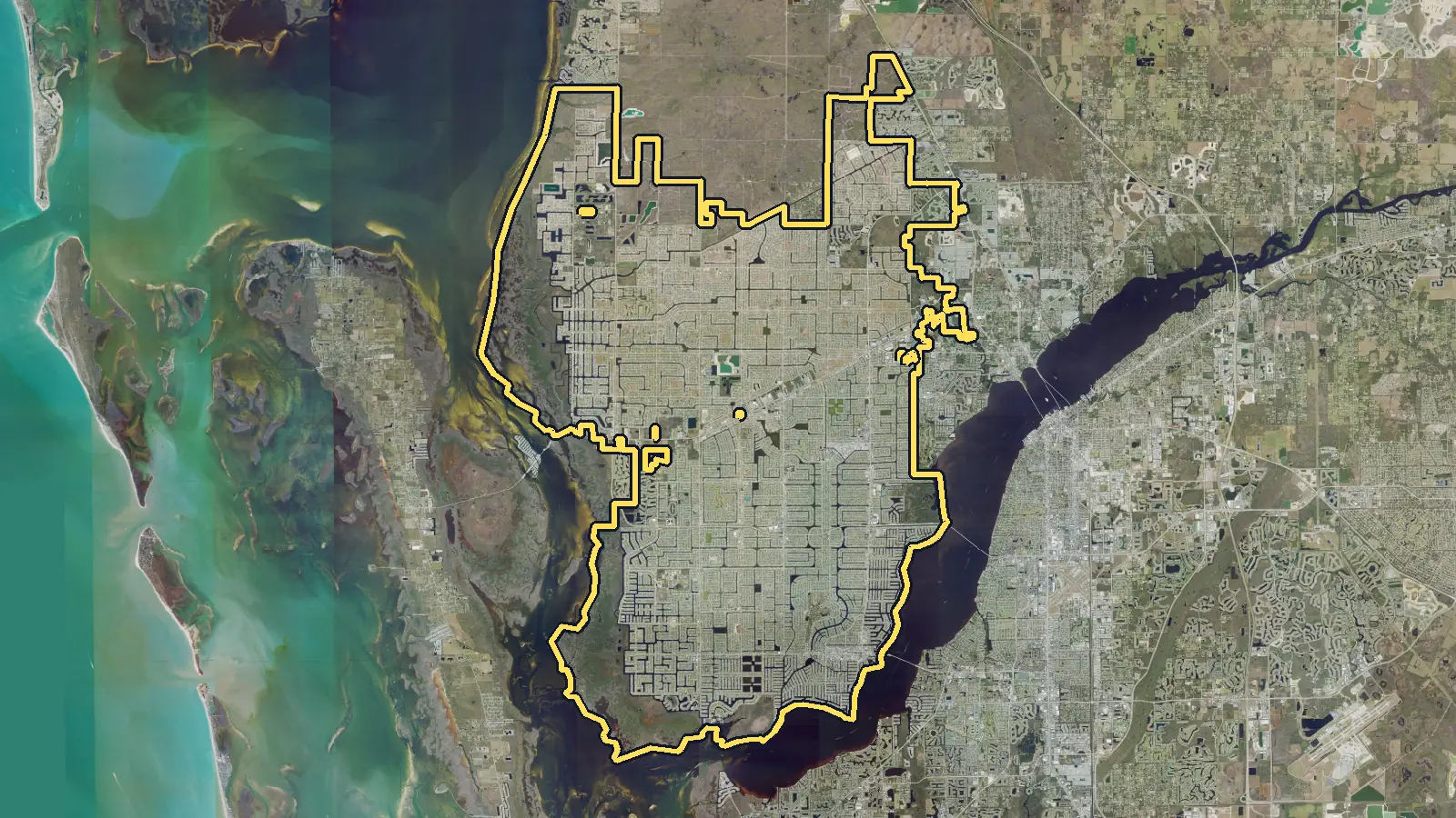 Aerial photo of Cape Coral, Florida, with the community's outline drawn on it