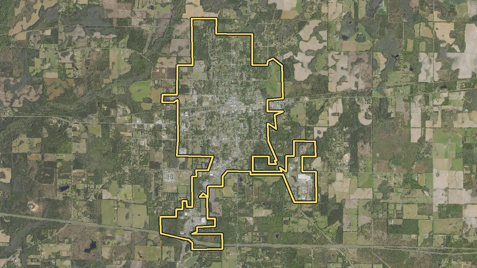 Aerial photo of Chipley, Florida, with the community's outline drawn on it