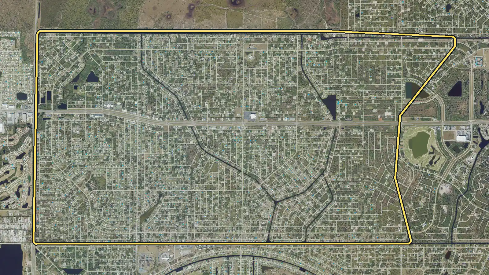 Aerial photo of Englewood East, Florida, with the community's outline drawn on it