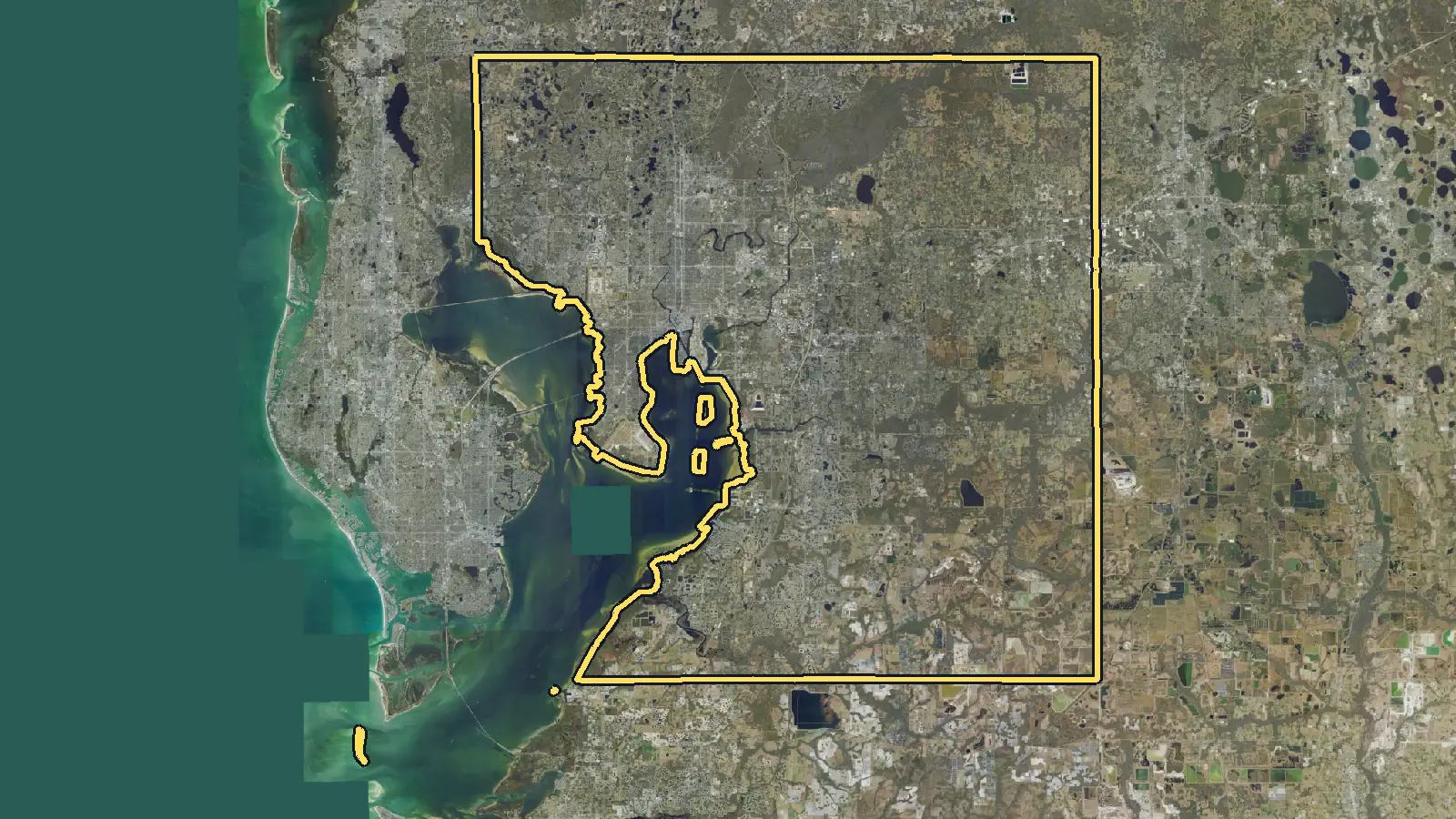 Aerial photo of Hillsborough County, Florida, with the county's outline drawn on it