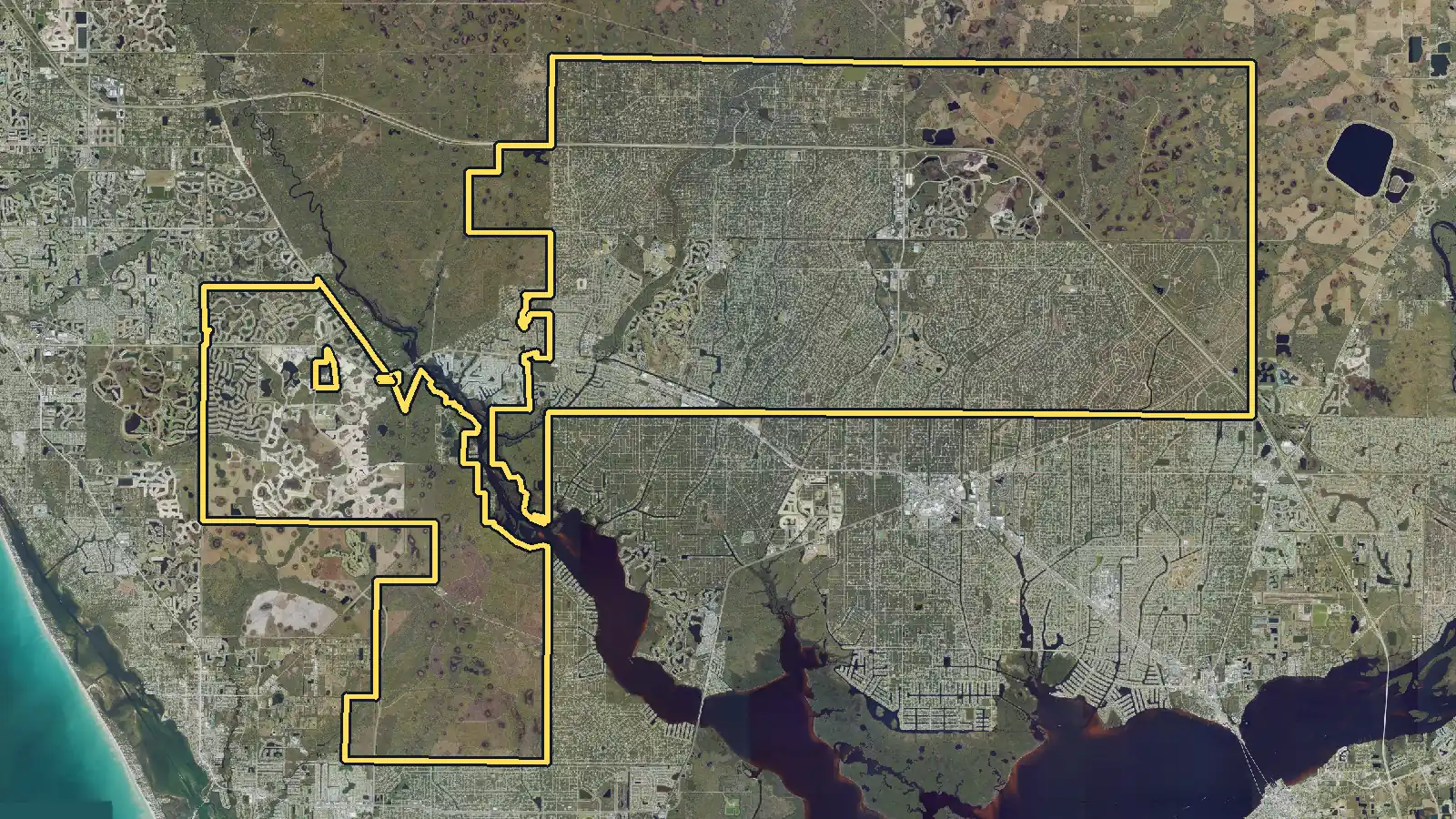 Aerial photo of North Port, Florida, with the community's outline drawn on it