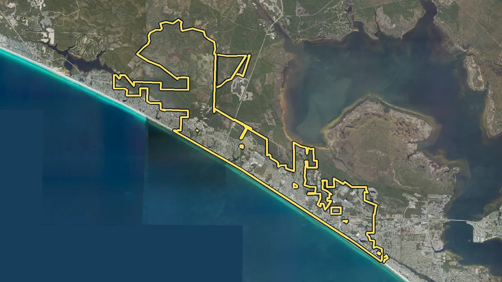 Aerial photo of Panama City Beach, Florida, with the community's outline drawn on it