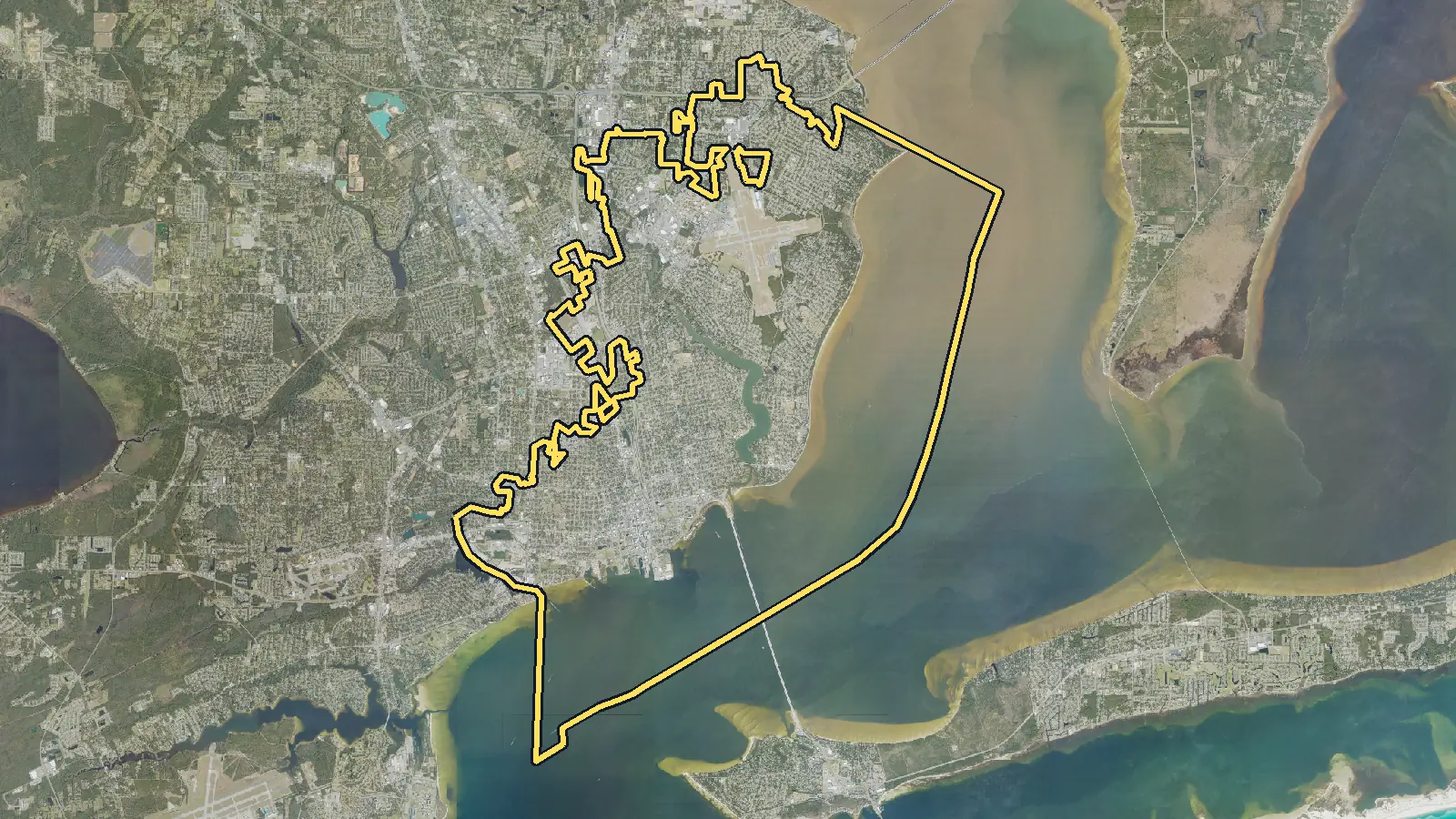 Aerial photo of Pensacola, Florida, with the community's outline drawn on it