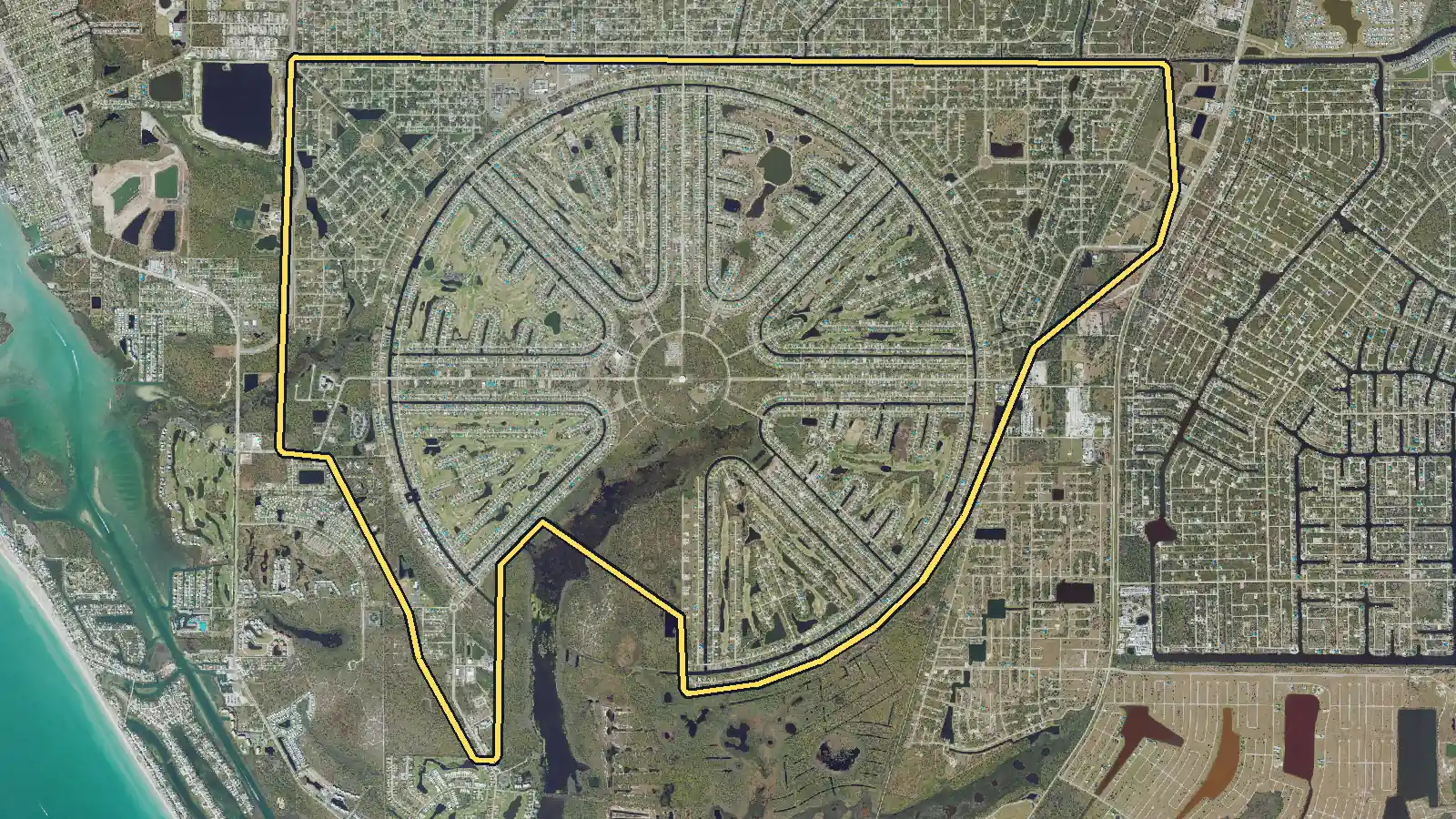 Aerial photo of Rotonda West, Florida, with the community's outline drawn on it