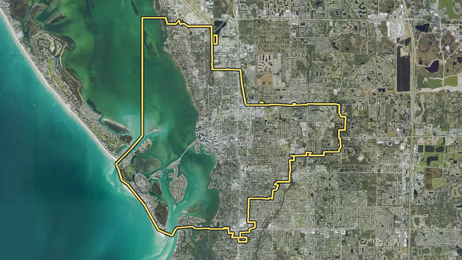 Aerial photo of the City of Sarasota, Florida, with its U.S. Census Bureau city boundary outlined