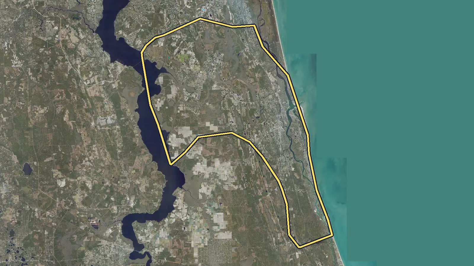Aerial photo of St. Augustine, Florida, with the community's outline drawn on it
