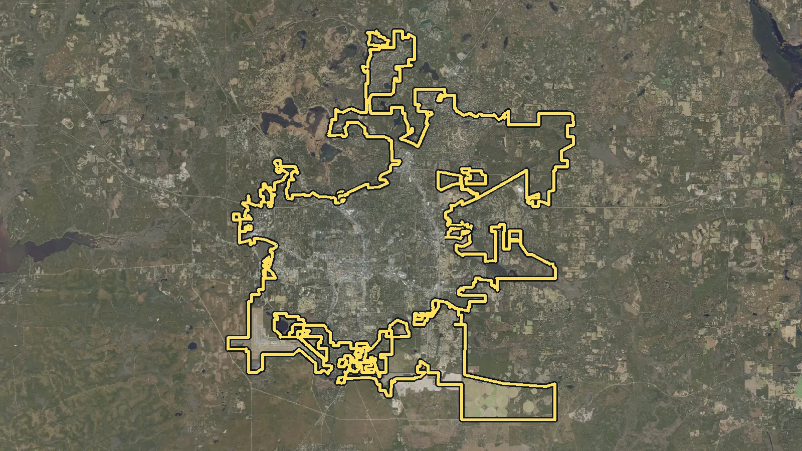 Aerial photo of Tallahassee, Florida, with the community's outline drawn on it