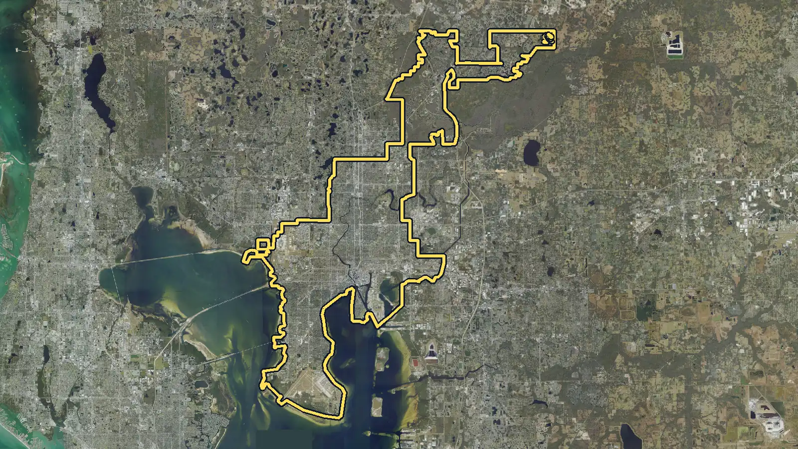 Aerial photo of Tampa, Florida, with the community's outline drawn on it