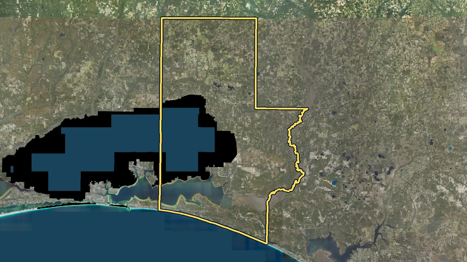 Aerial photo of Walton County, Florida, with the county's outline drawn on it